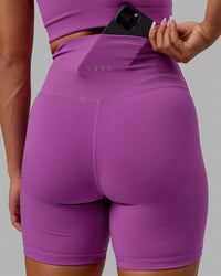 Woman wearing Base 2.0 Ultra High-Rise 6" Short - Hyper Violet
