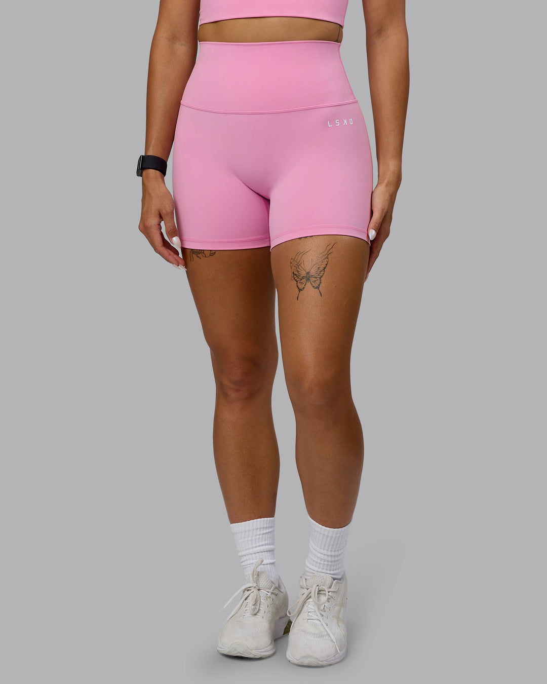 Woman wearing Base 2.0 X-Short Tights - Bubblegum