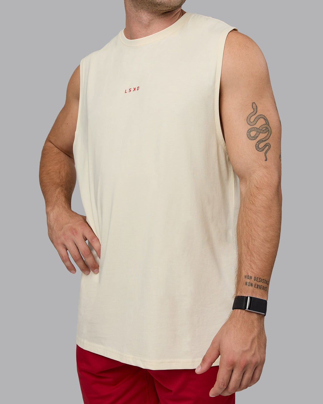 Man wearing Base FLXCotton Tank - Ivory-Cherry Red