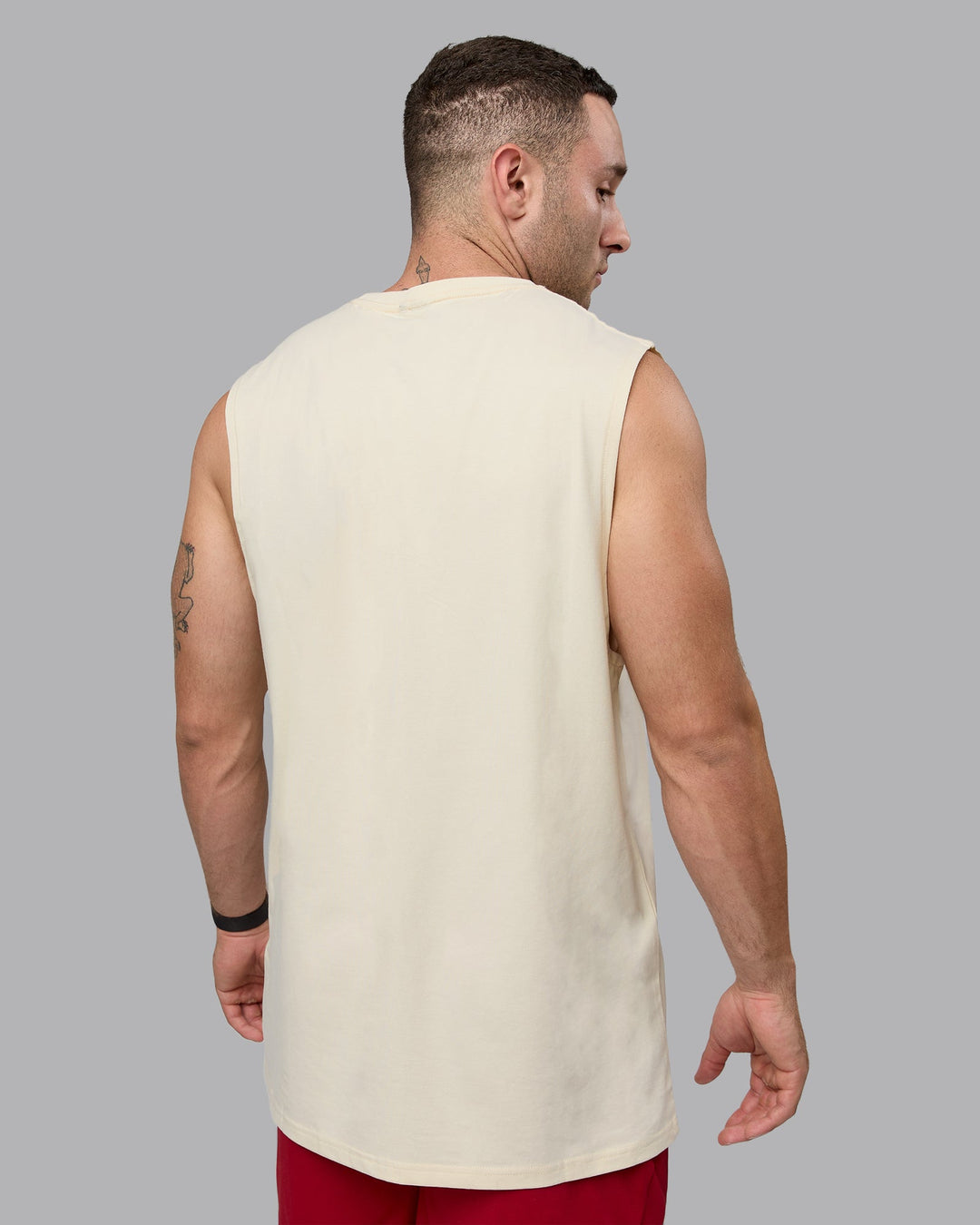 Man wearing Base FLXCotton Tank - Ivory-Cherry Red