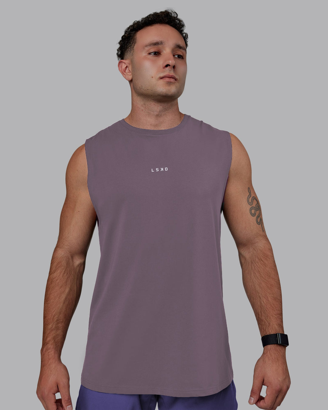 Man wearing Base FLXCotton Tank - Purple Sage