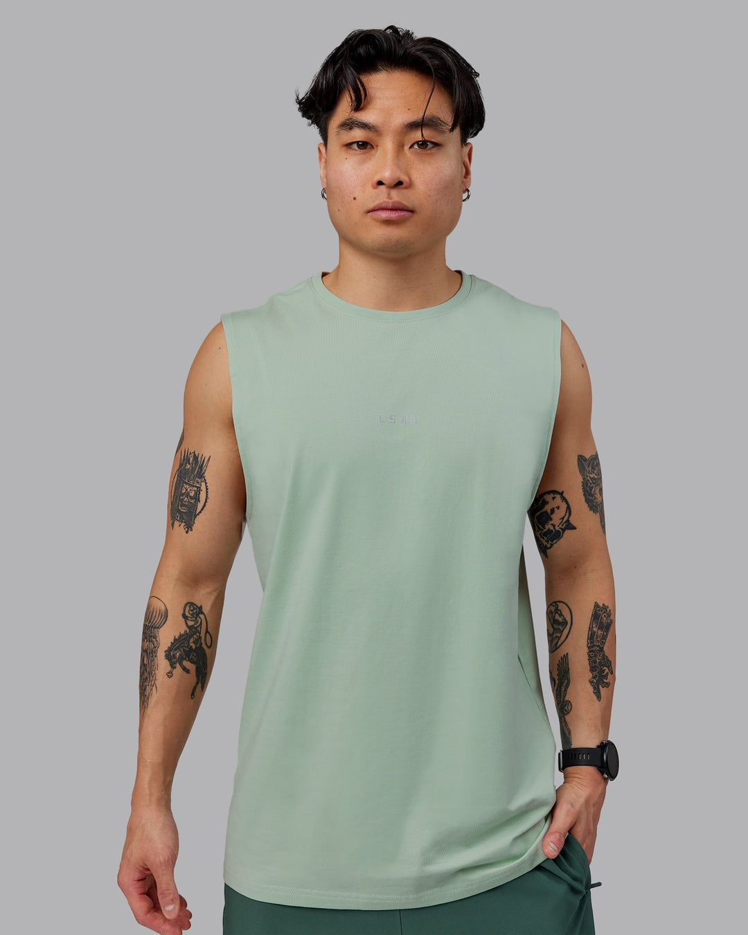 Man wearing Base FLXCotton Tank - Surf Spray