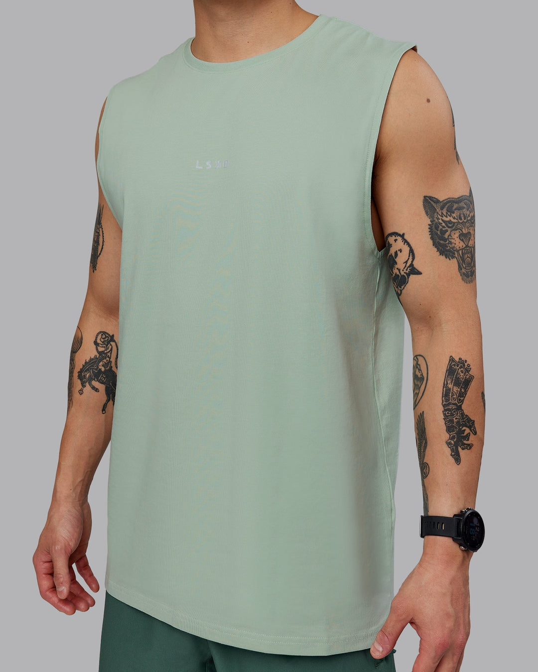 Man wearing Base FLXCotton Tank - Surf Spray