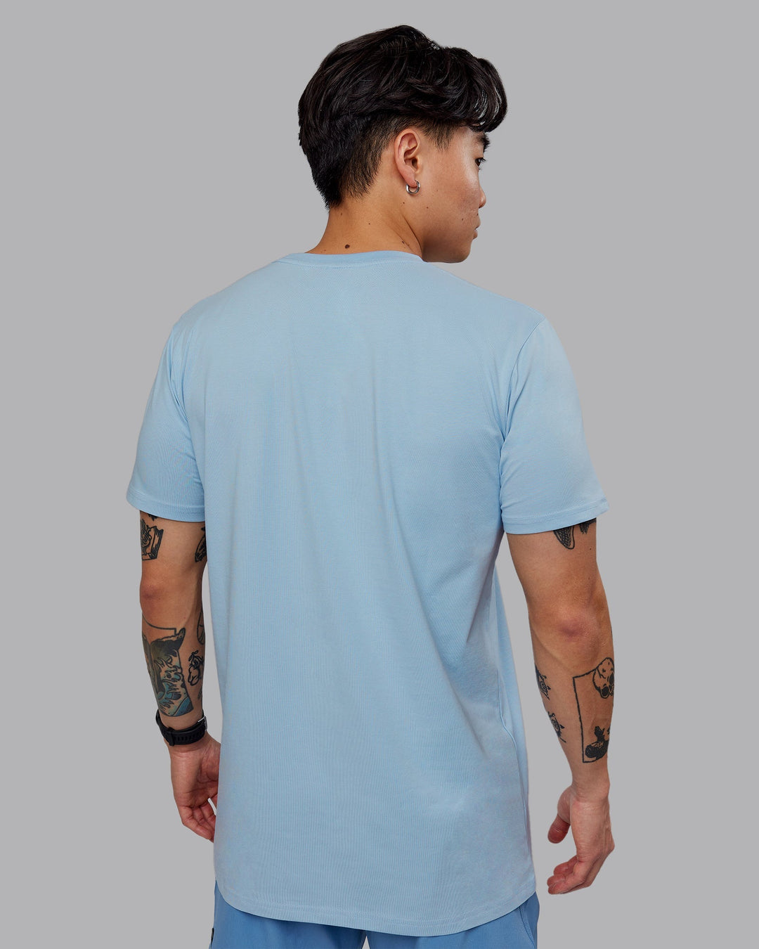 Man wearing Base FLXCotton Tee - Ice Blue