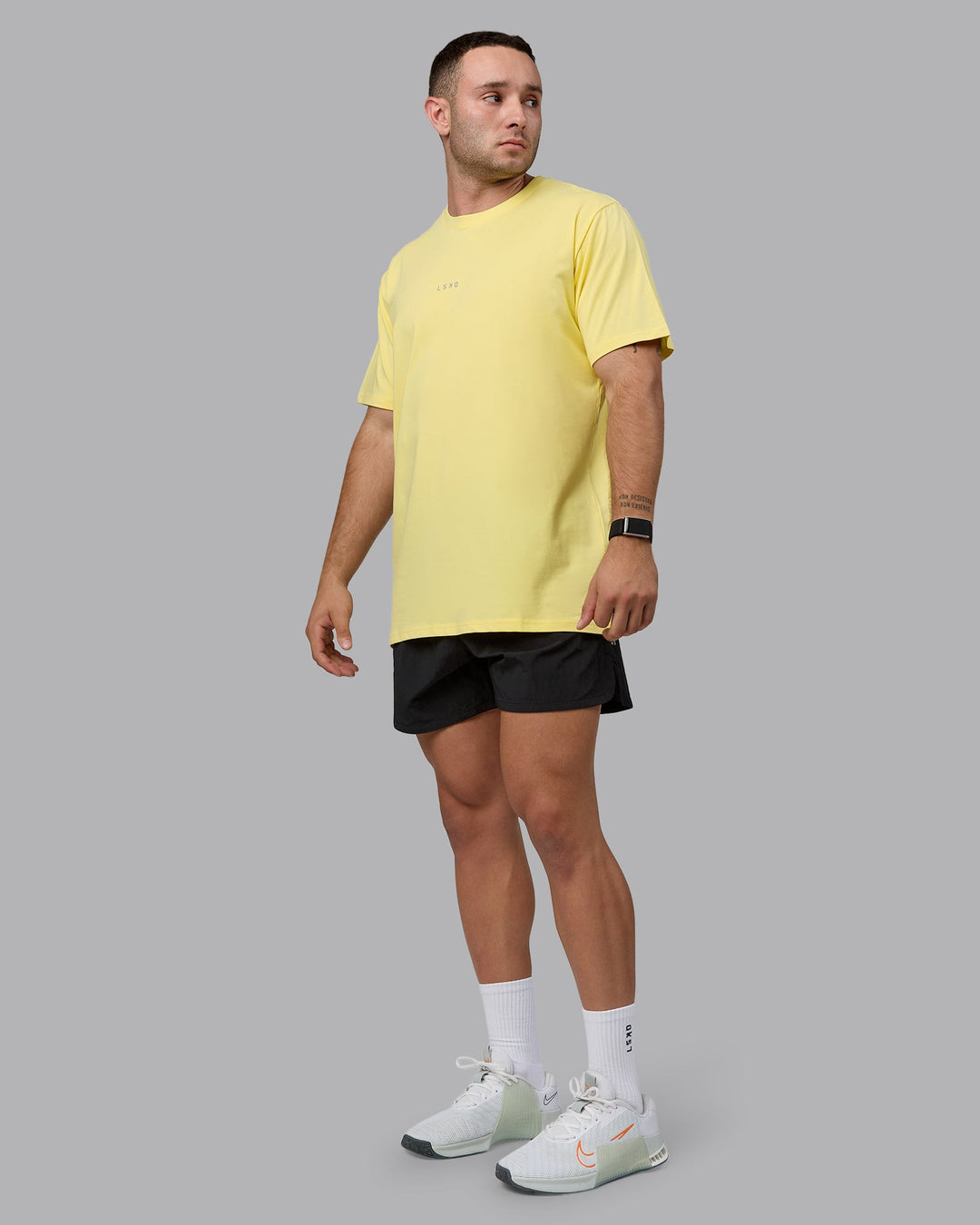 Man wearing Base FLXCotton Tee - Pale Yellow