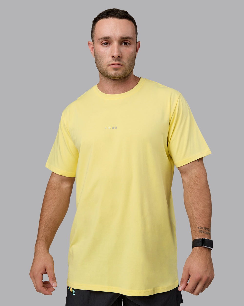 Man wearing Base FLXCotton Tee - Pale Yellow