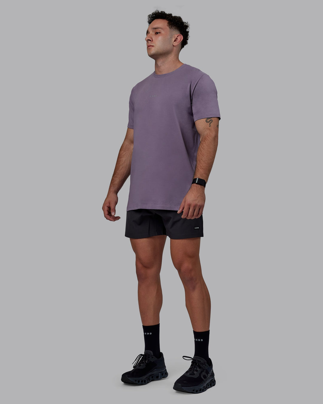 Man wearing Base FLXCotton Tee - Purple Sage