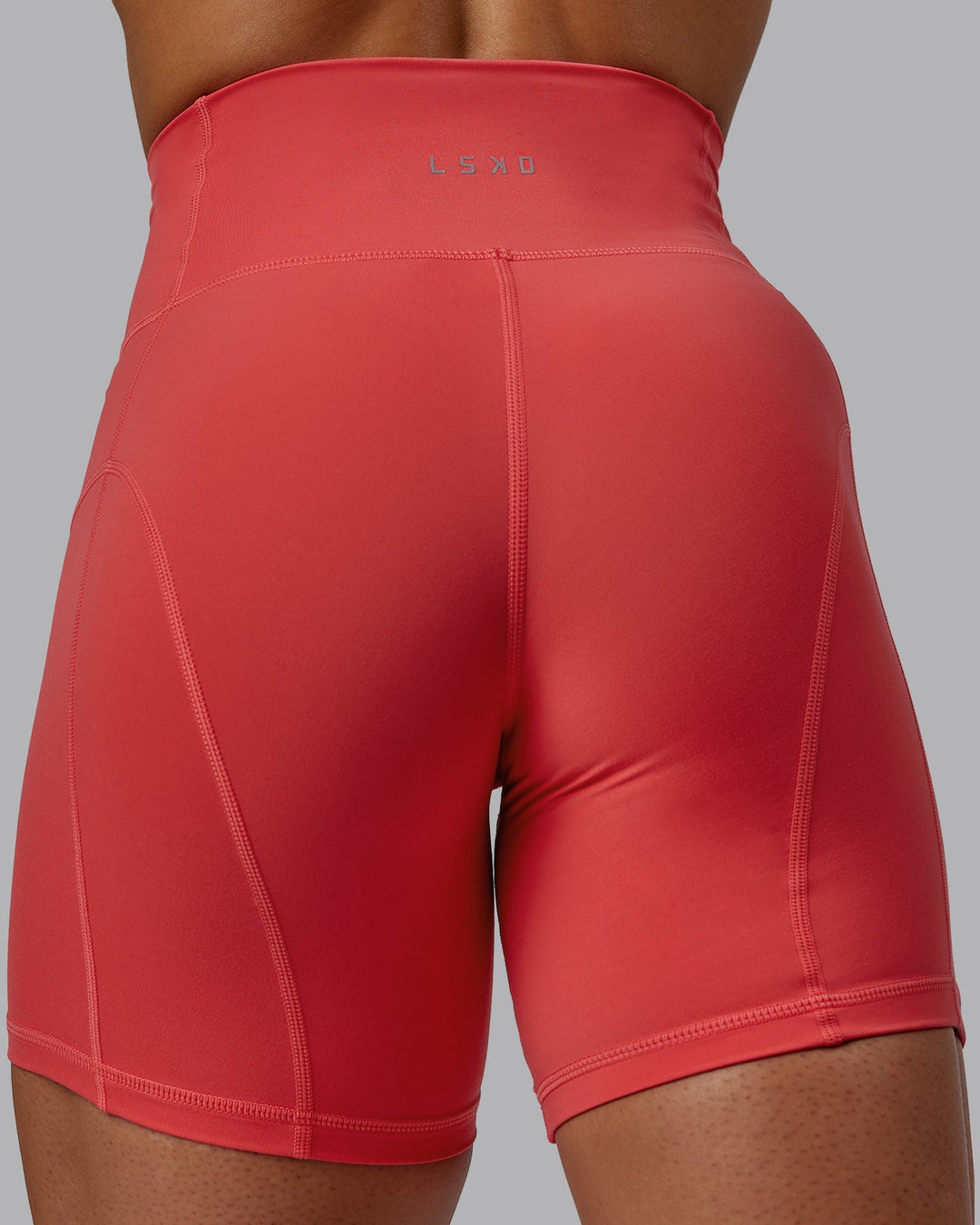 Woman wearing Bend Mid-Length Shorts - Cayenne