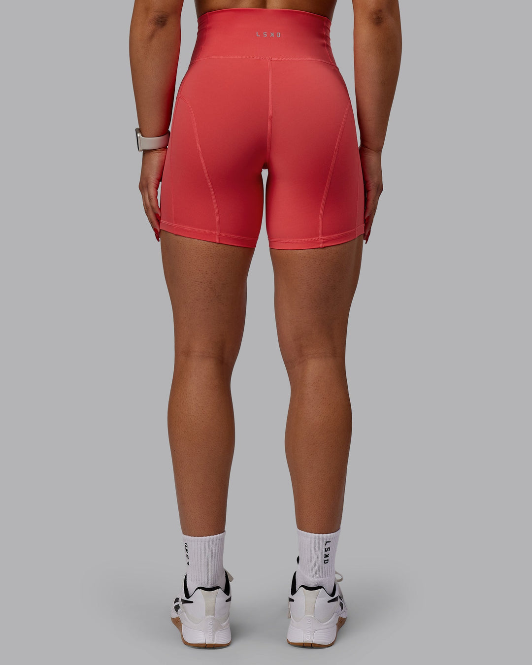 Woman wearing Bend Mid-Length Shorts - Cayenne