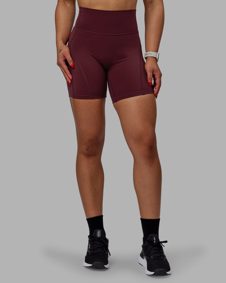 Woman wearing Bend Mid-Length Shorts - Dark Cherry
