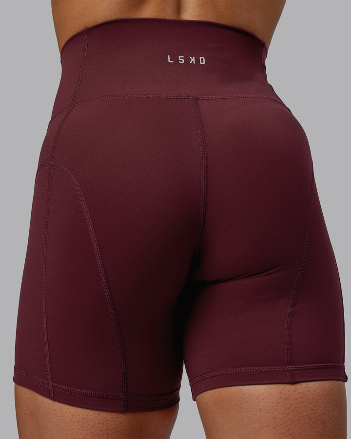 Woman wearing Bend Mid-Length Shorts - Dark Cherry
