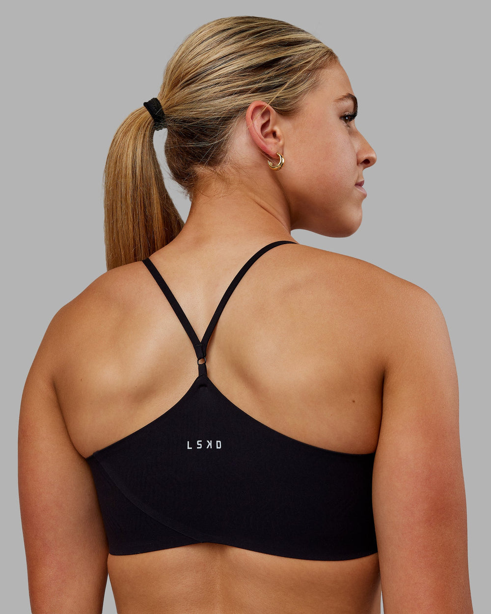 Woman wearing Bonded Sports Bra - Black