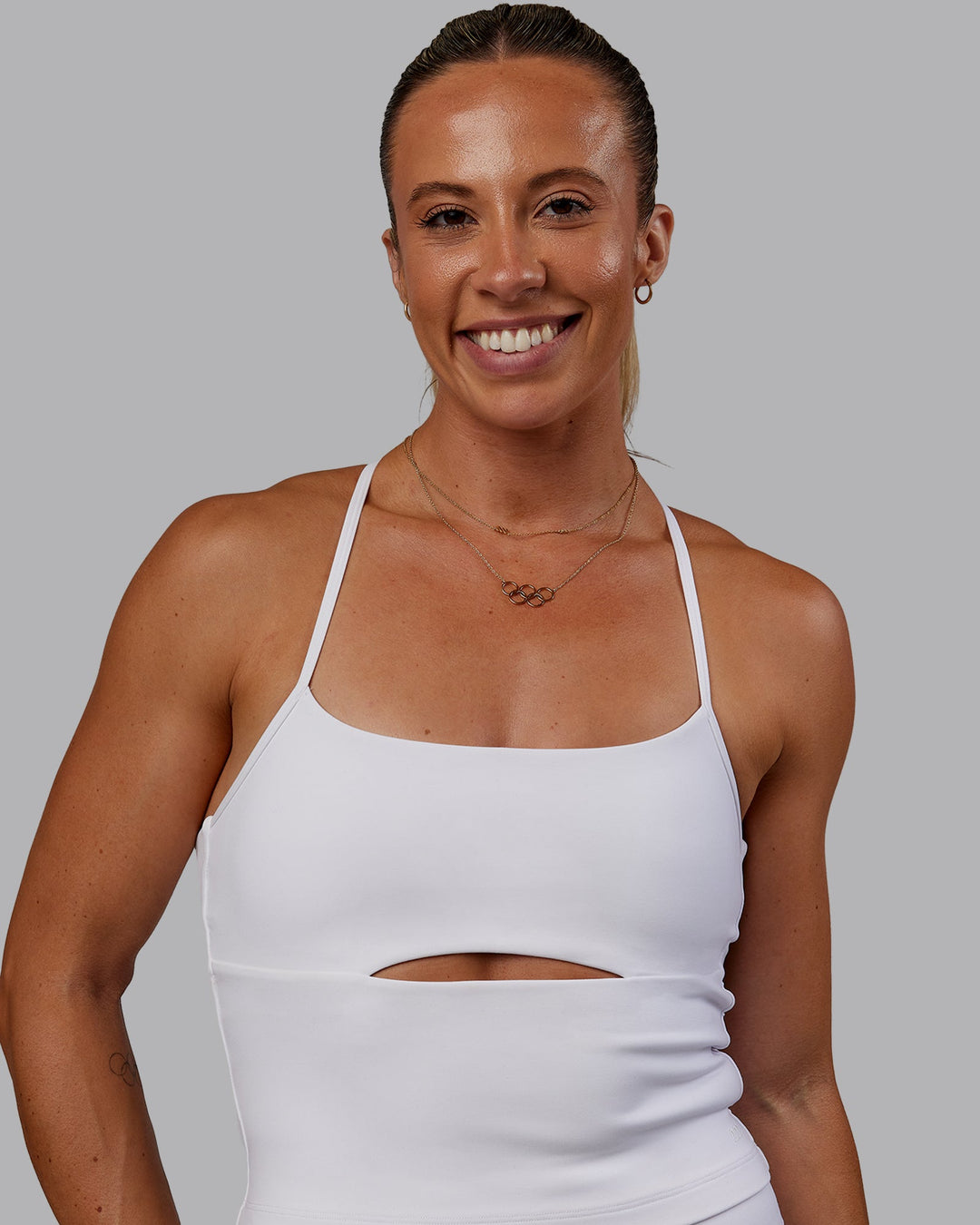 Woman wearing Bree Masters Form Shelf Bra Tank - White