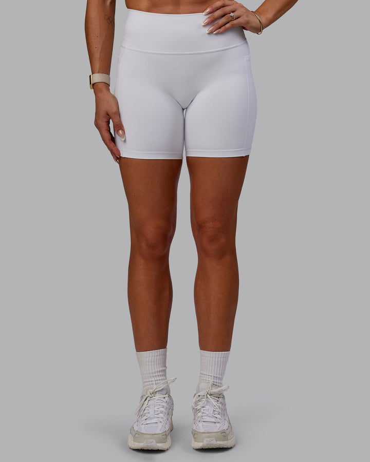 Woman wearing Bree Masters Fusion Mid Short Tights with Pockets - White
