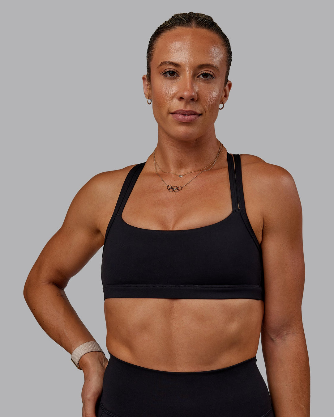 Woman wearing Bree Masters Velocity Sports Bra - Black