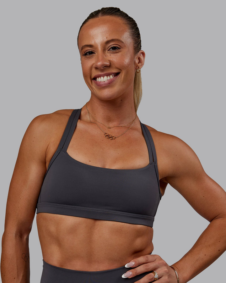 Woman wearing Bree Masters Velocity Sports Bra - Stormy
