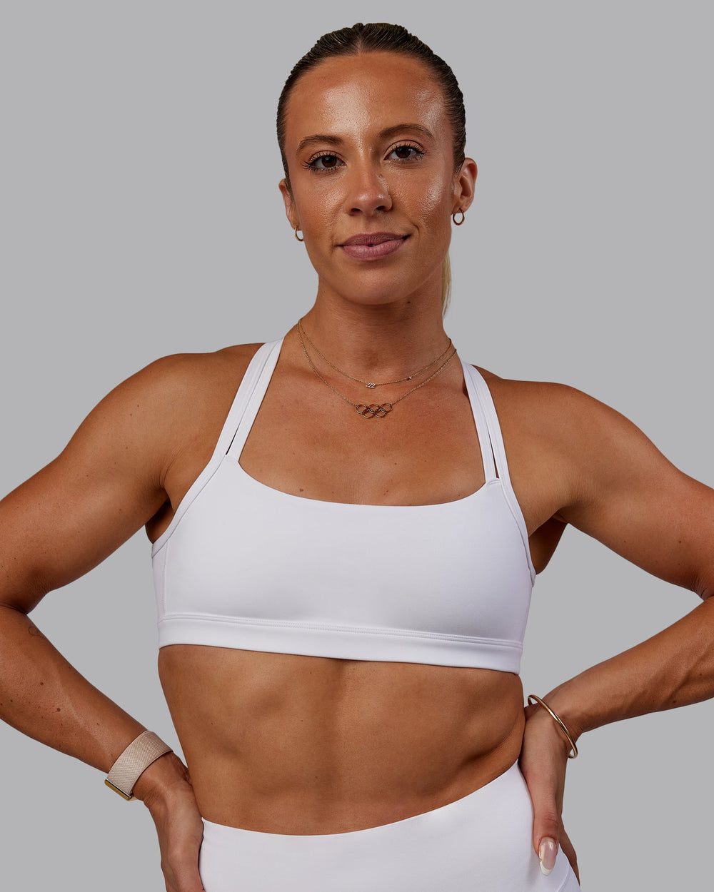 Woman wearing Bree Masters Velocity Sports Bra - White