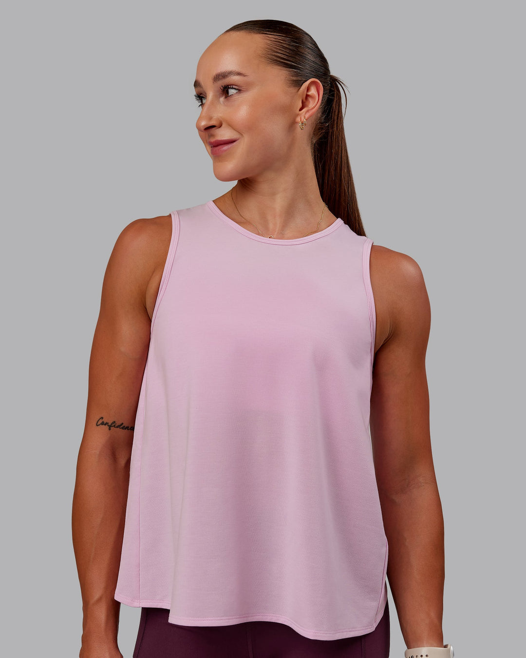 Woman wearing Breeze Training Tank - Marshmallow