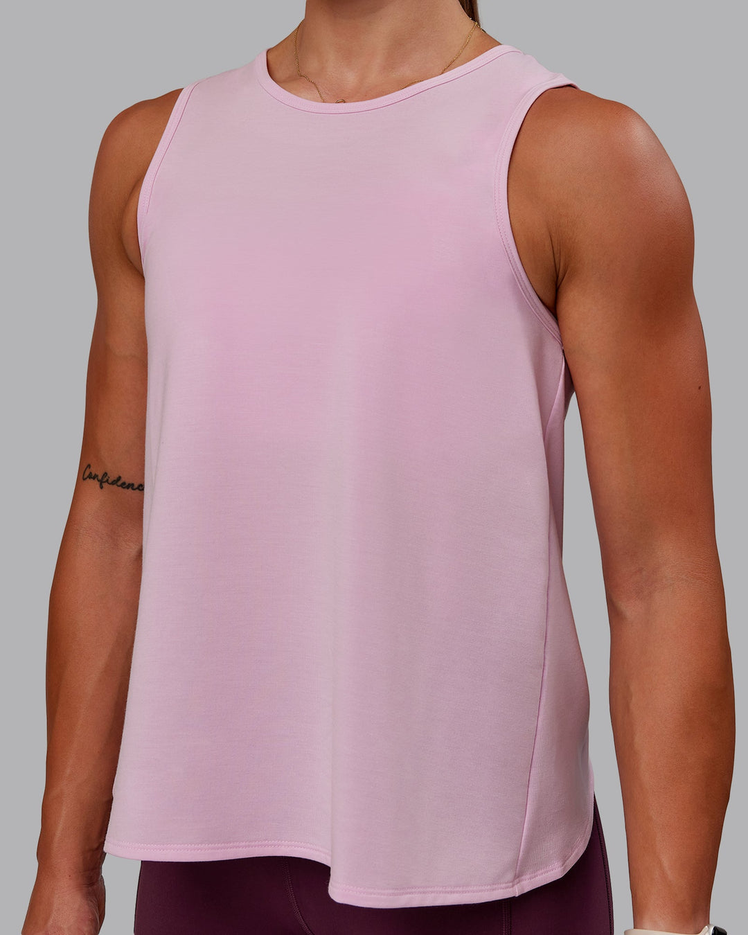 Woman wearing Breeze Training Tank - Marshmallow