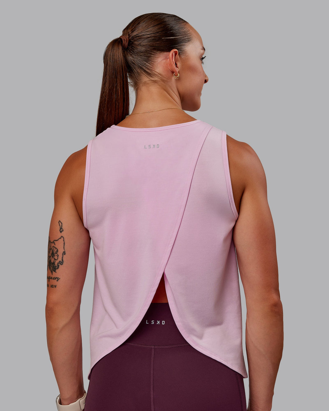 Woman wearing Breeze Training Tank - Marshmallow