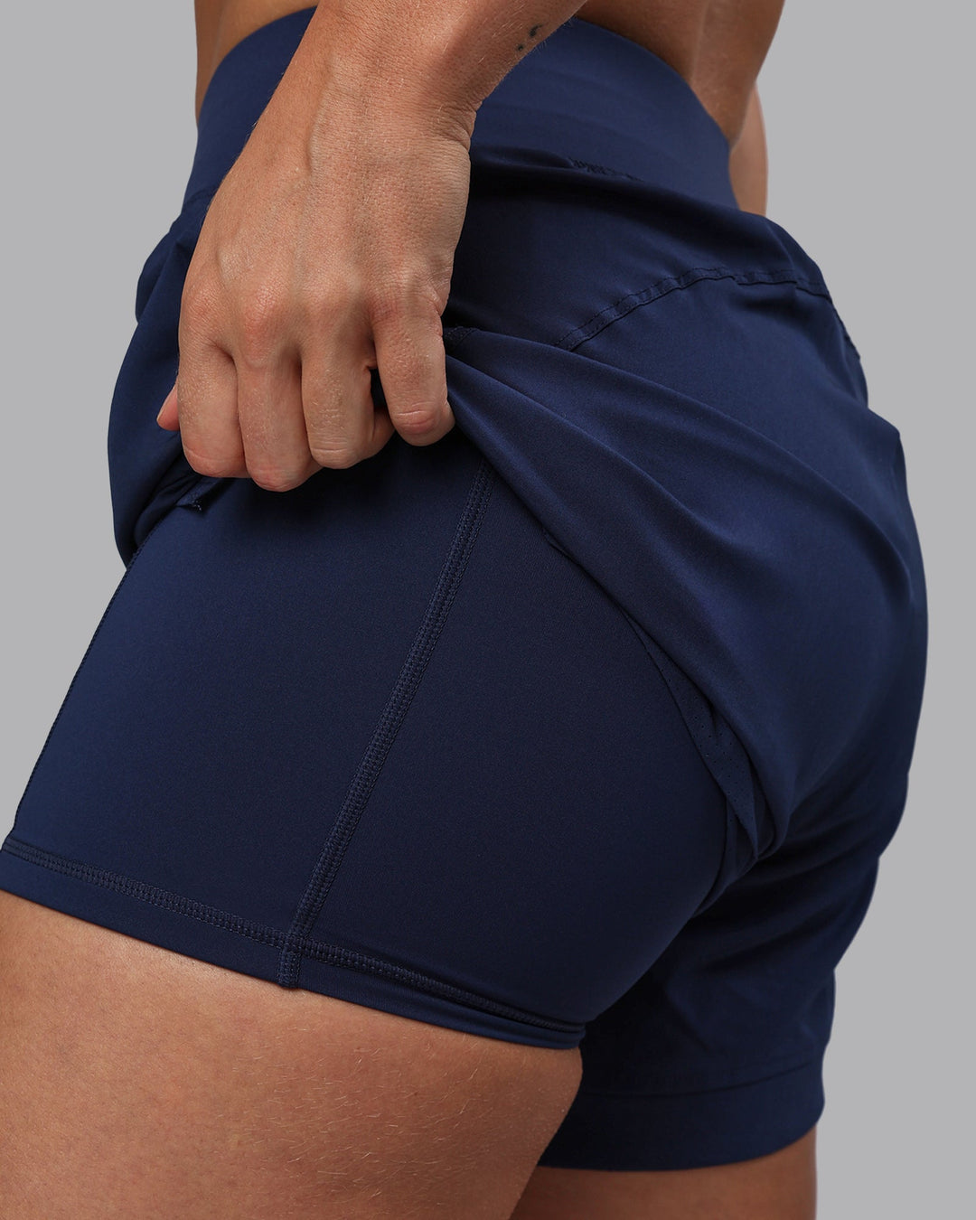 Woman wearing Challenger 5&quot; Lined Performance Shorts - Future Navy