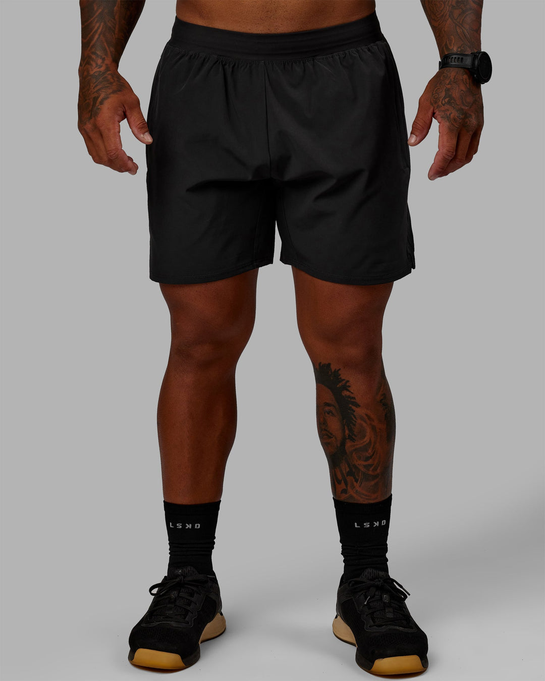 Man wearing Challenger 6&quot; Lined Performance Shorts - Pirate Black