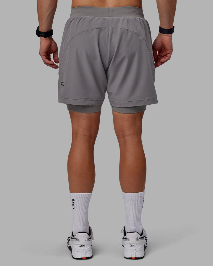 Man wearing Challenger 6&quot; Lined Performance Shorts - Storm Front
