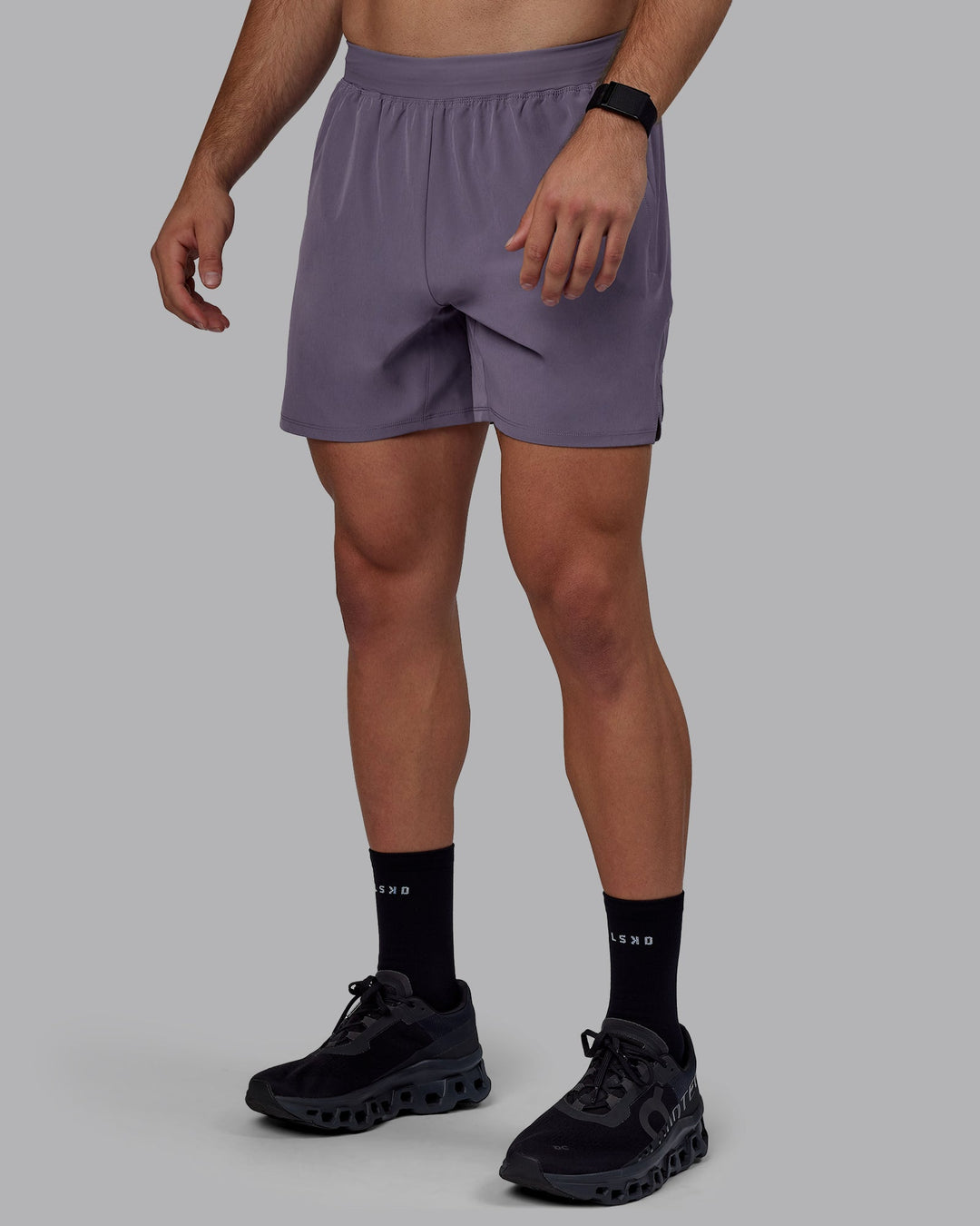 Man wearing Challenger 6&quot; Performance Shorts - Purple Sage