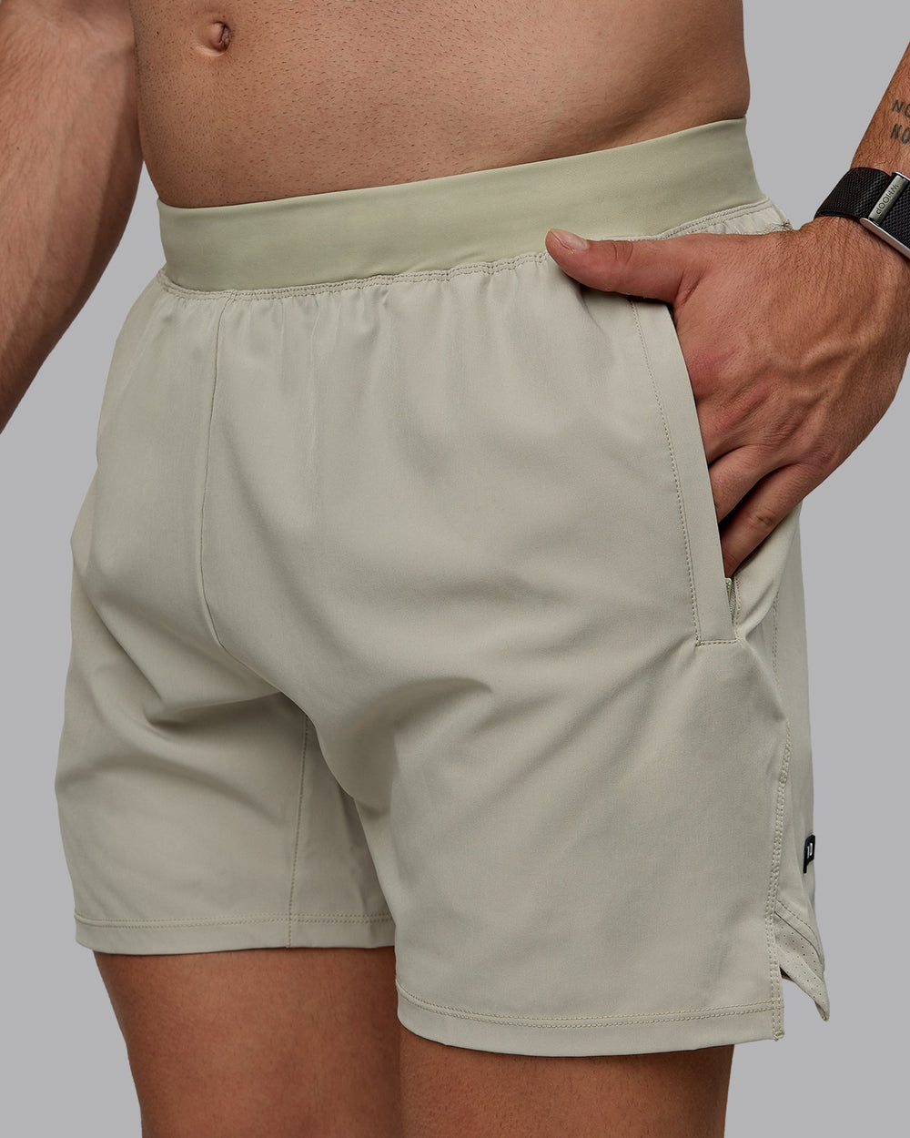 Man wearing Challenger 6" Performance Shorts - Sustained Grey