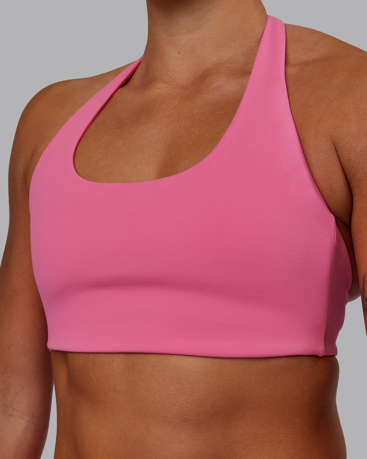 Woman wearing Challenger Sports Bra - Carmine Rose
