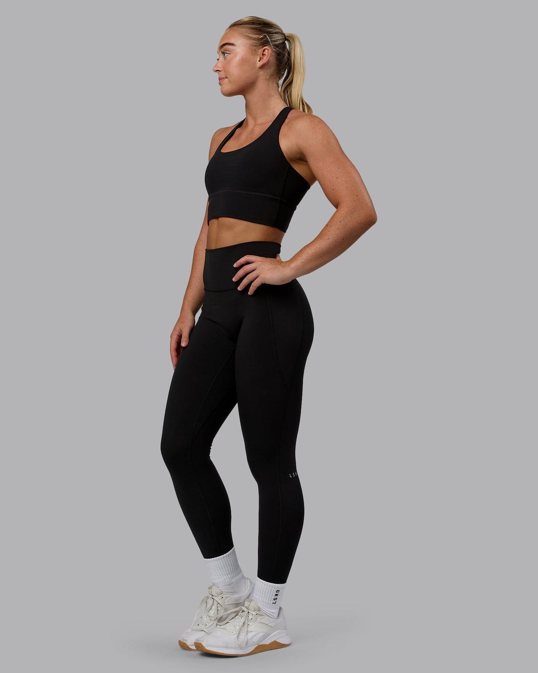 Woman wearing Circuit Sports Bra - Black