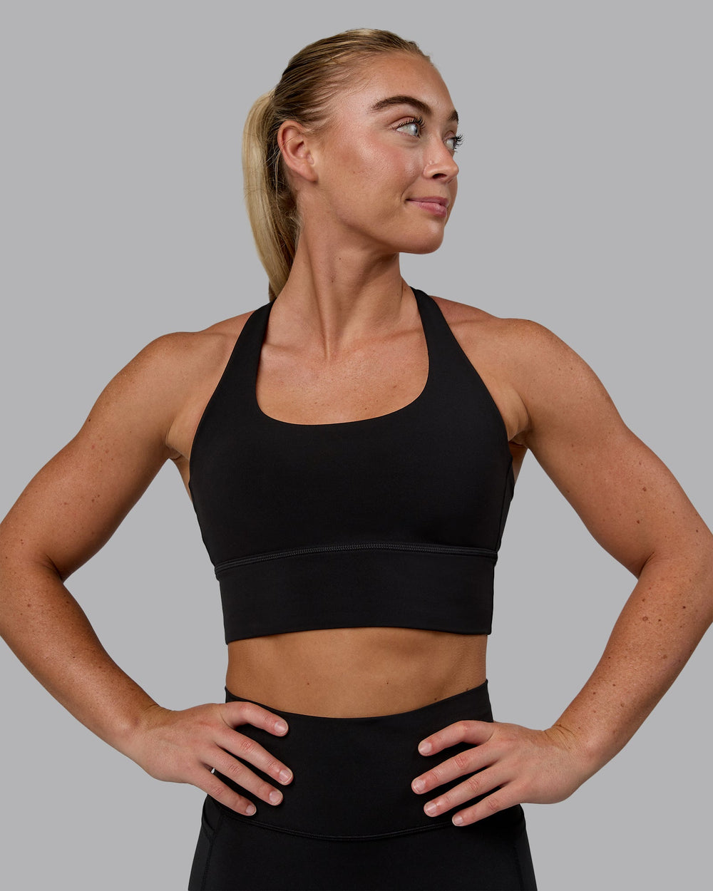 Woman wearing Circuit Sports Bra - Black