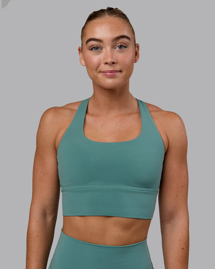 Woman wearing Circuit Sports Bra - Sagebrush
