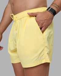 Man wearing Classic 5" Shorts - Lemon