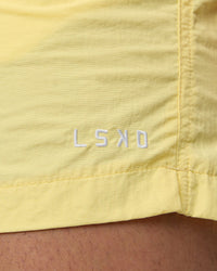 Man wearing Classic 5" Shorts - Lemon