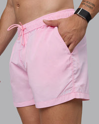 Man wearing Classic 5" Shorts - Pale Pink