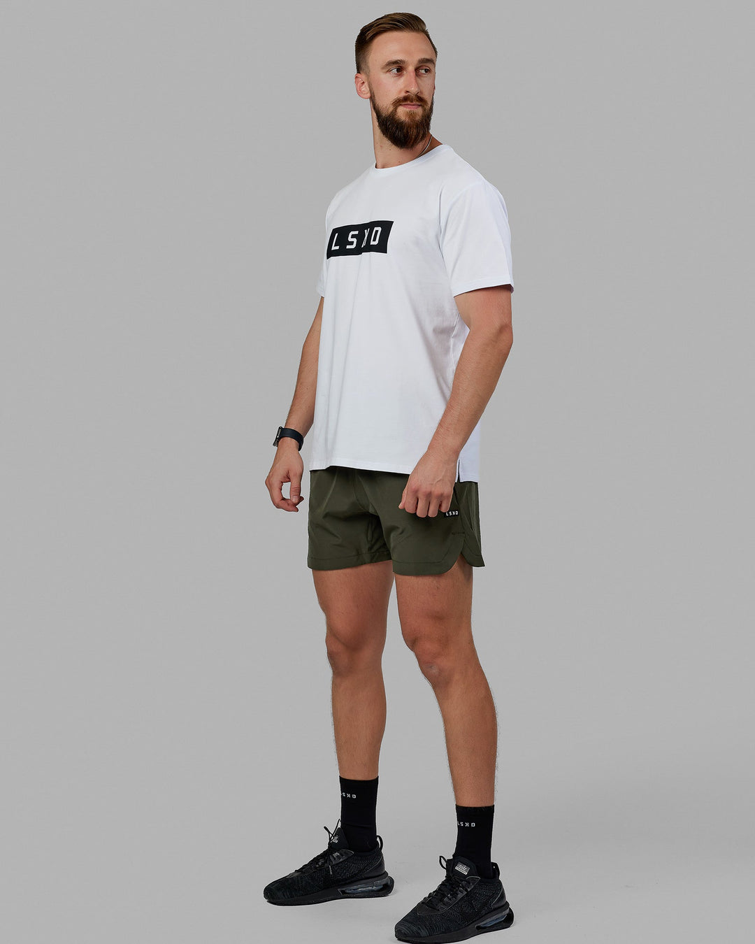 Man wearing Competition 5" Performance Short - Forest Night