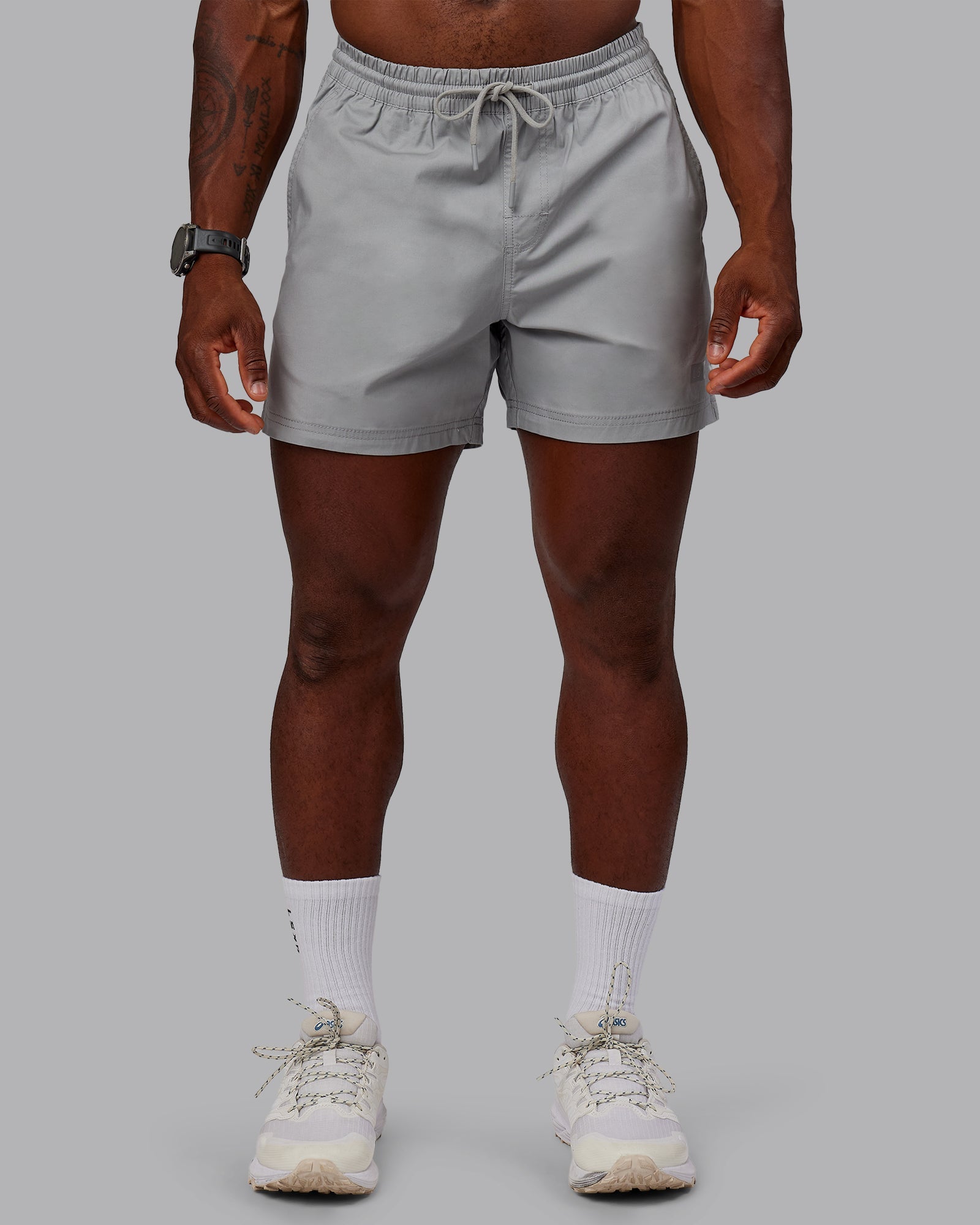 Man wearing Daily 5" Shorts - Circular Grey