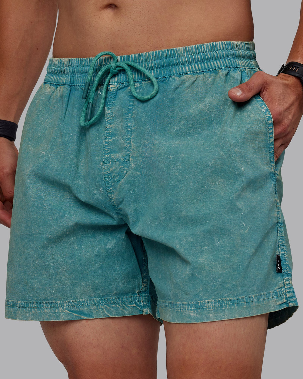 Man wearing Washed Daily 5" Shorts - Sage Brush