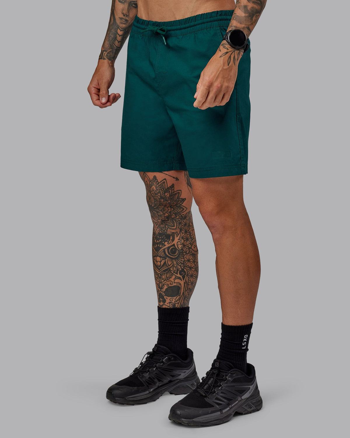 Man wearing Daily 7" Shorts - Dark Moss - view 2