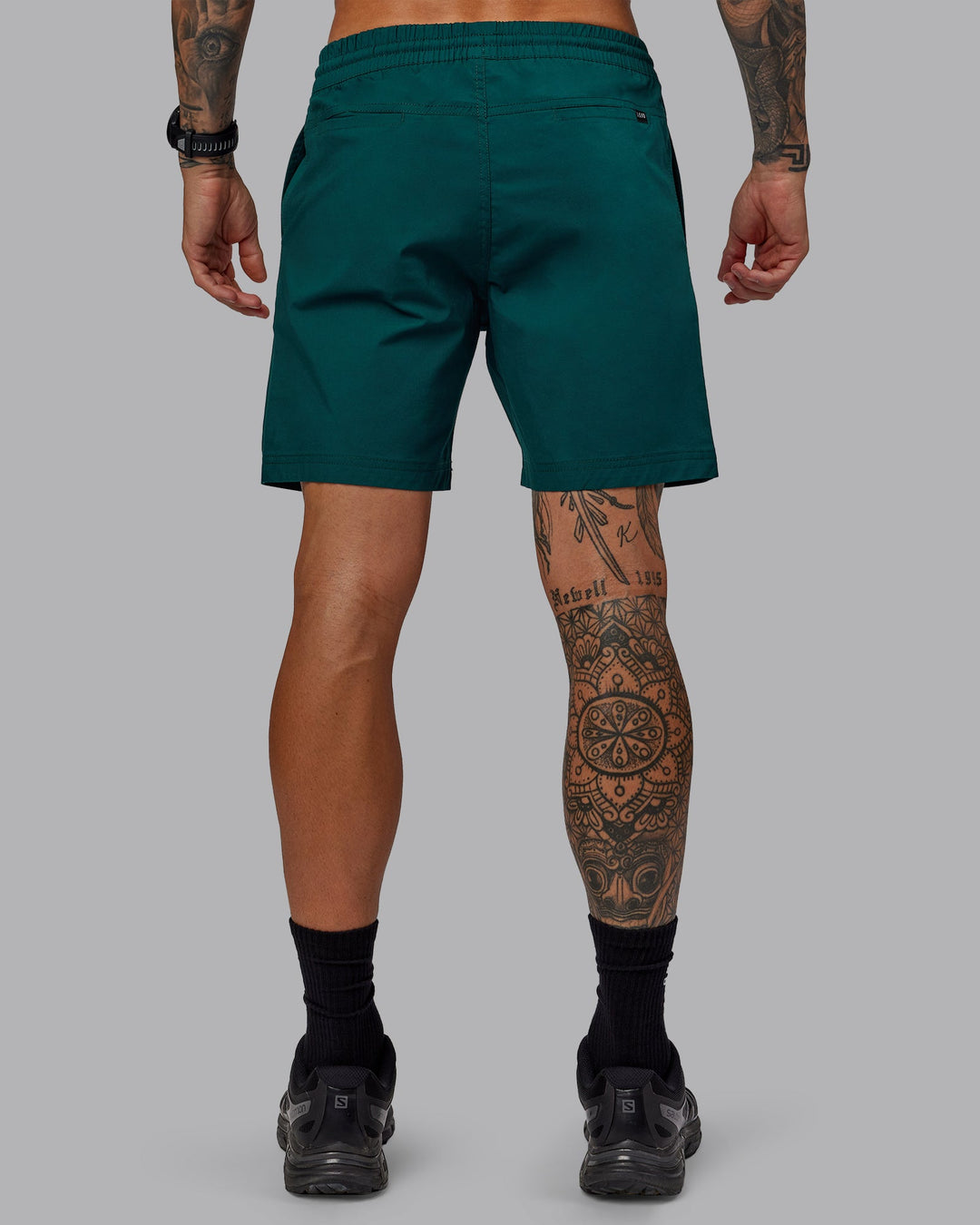 Man wearing Daily 7" Shorts - Dark Moss - view 4