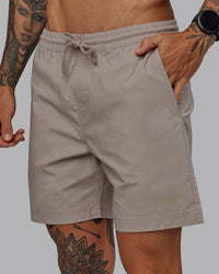 Man wearing Daily 7" Shorts - Shale Beige