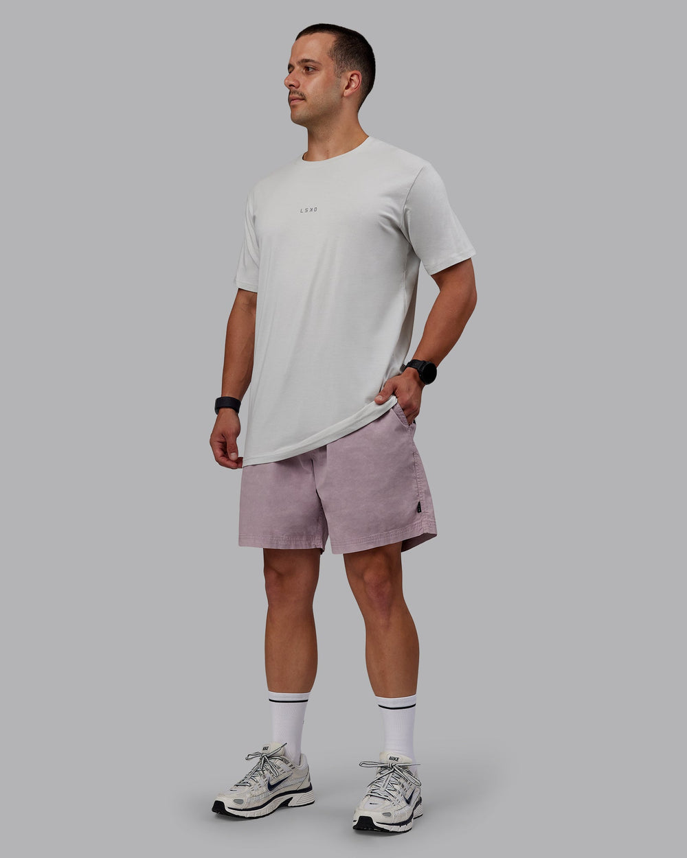 Man wearing Washed Daily 7" Shorts - Greyish Purple