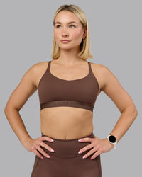 Woman wearing Define Sports Bra - Chocolate Martini | Model:Halle | Size:S