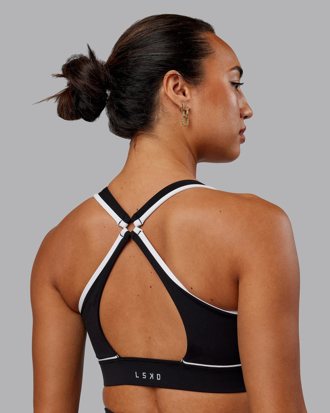 Woman wearing Distinction Sports Bra - Black-White