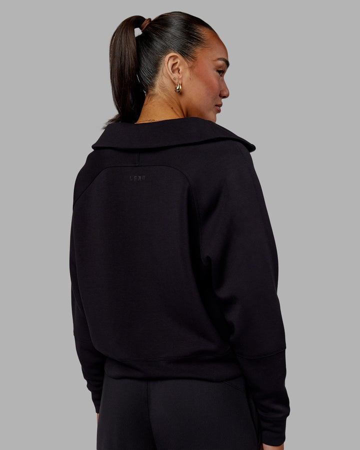 Woman wearing Elevate SoftTouch 1/2 Zip Sweater - Black-Black
