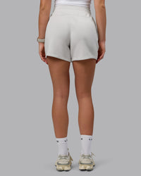 Woman wearing Elevate SoftTouch 4" Shorts - Clay-Clay