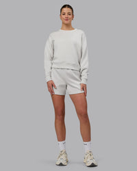 Woman wearing Elevate SoftTouch 4" Shorts - Clay-Clay
