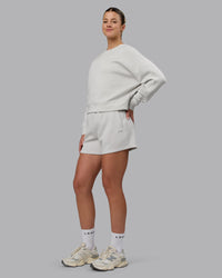 Woman wearing Elevate SoftTouch 4" Shorts - Clay-Clay