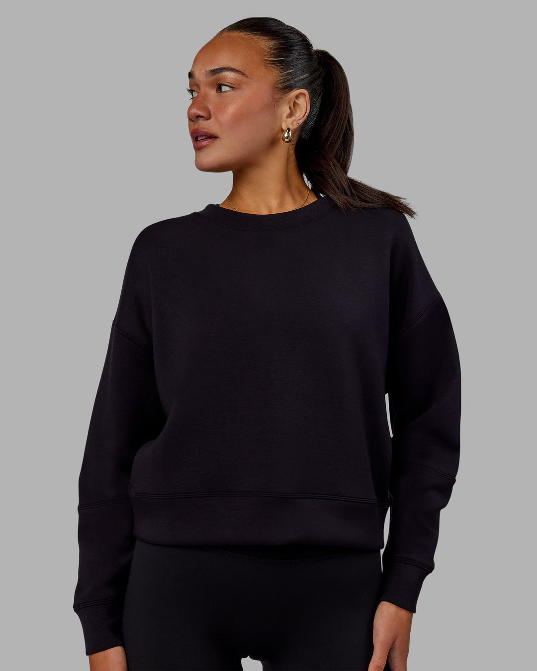 Woman wearing Elevate SoftTouch Crew Neck Sweater - Black-Black